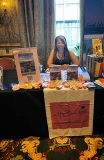 Harper Black at an indoor author event