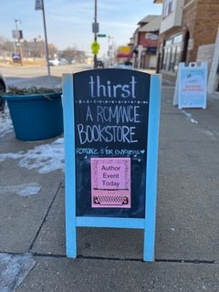 Thirst: A Romance Bookstore chalkboard sign for author event